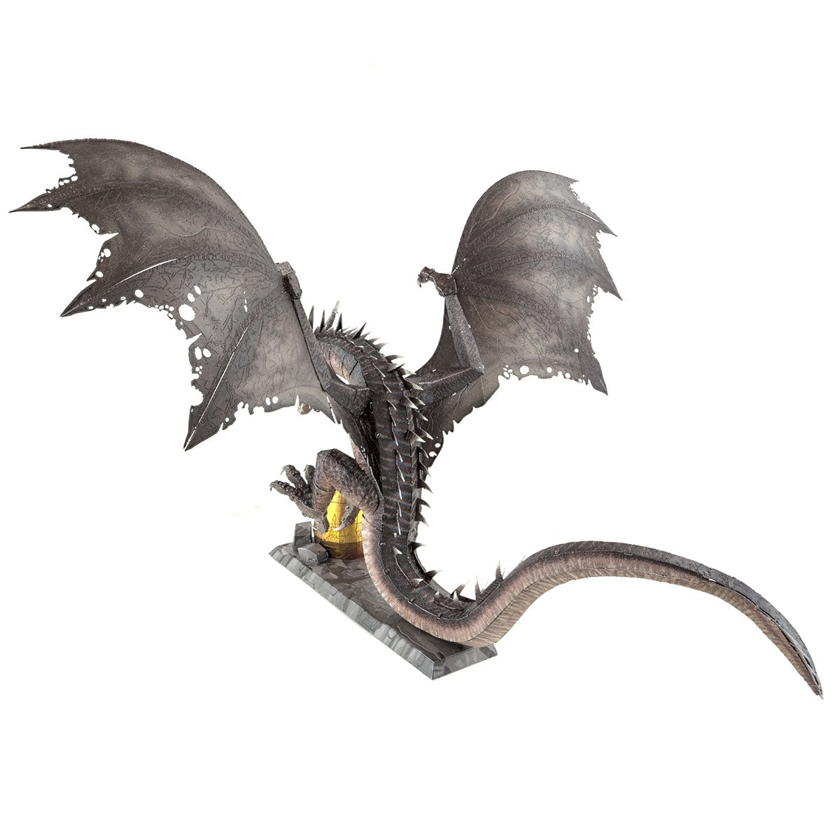 Metal model of a Hungarian Horntail from Harry Potter with detailed wings and tail on a white background