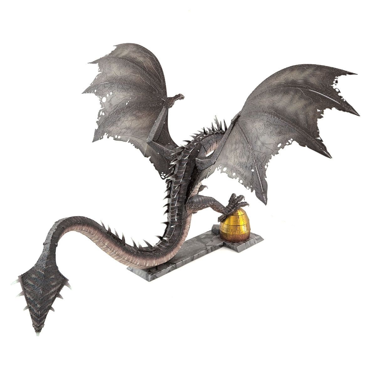 Metal model of a Hungarian Horntail from Harry Potter with wings spread on a white background
