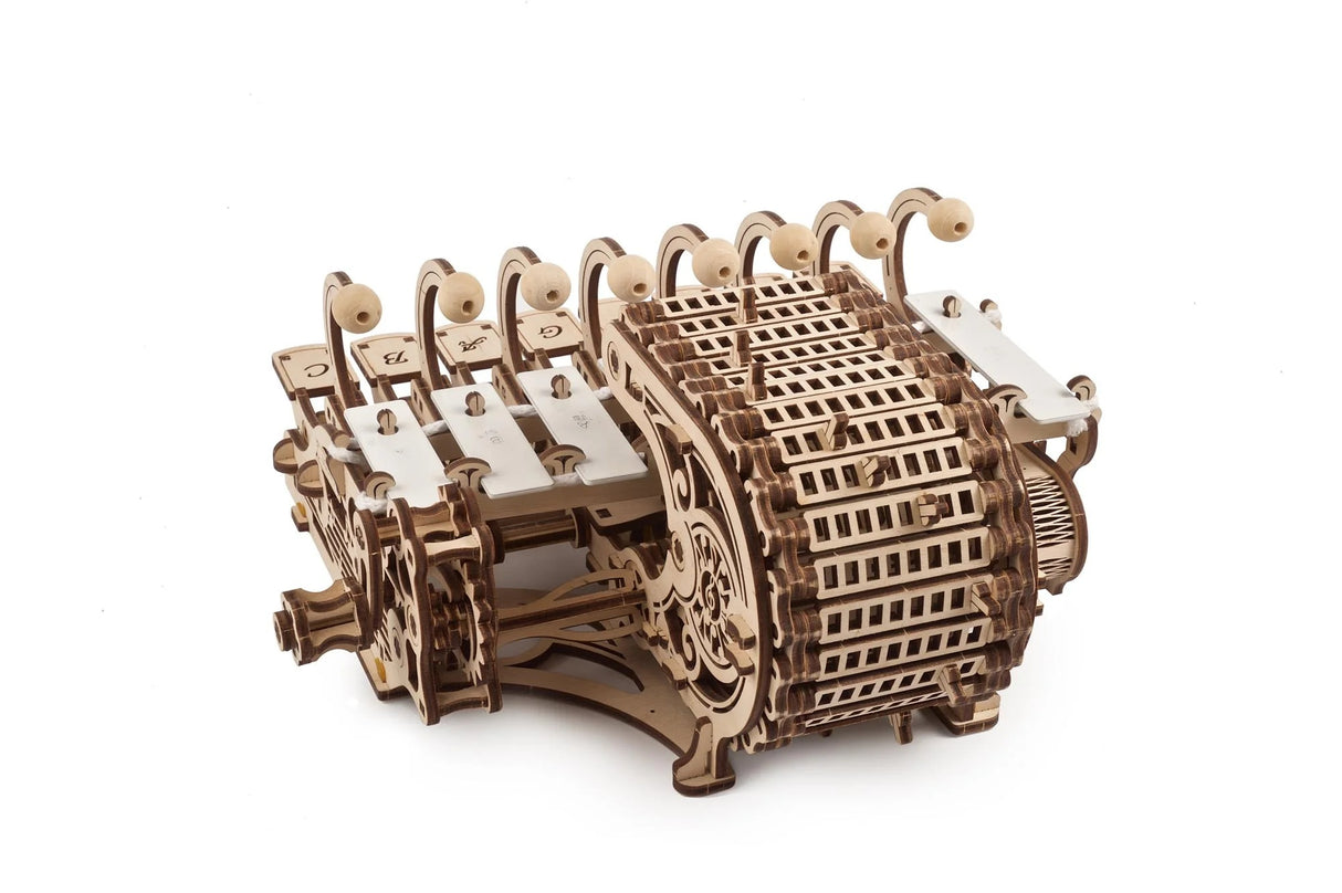 Mechanical Celesta wooden model on a white background