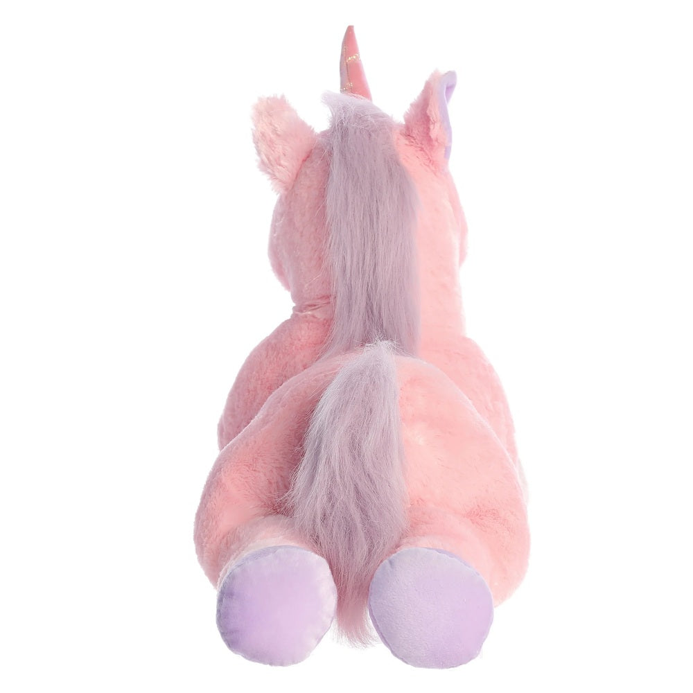 Pink and purple unicorn plush toy on a white background