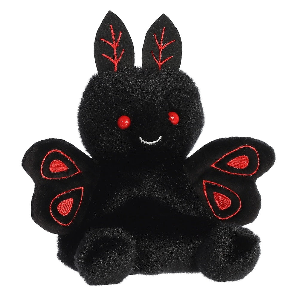 Black plush toy with red accents on a white background