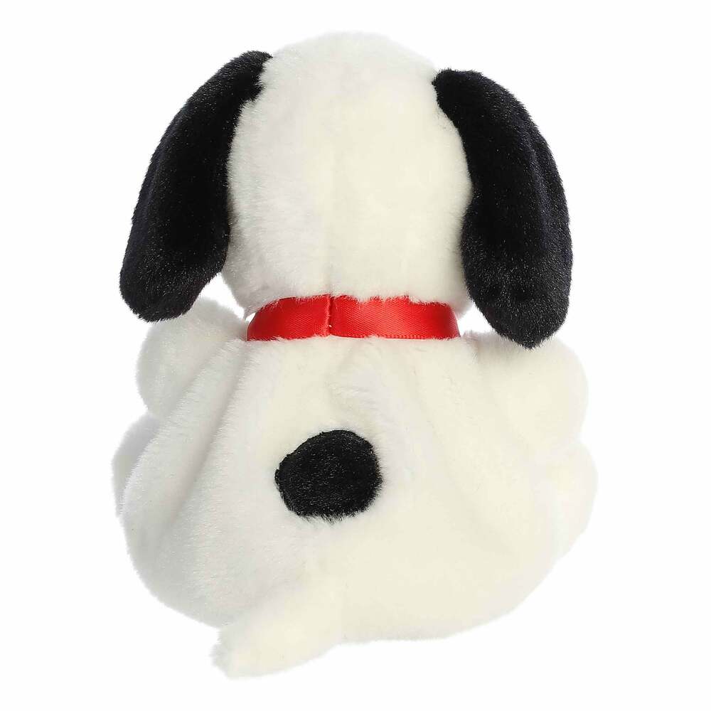 Plush dog toy with black ears and red collar on a white background