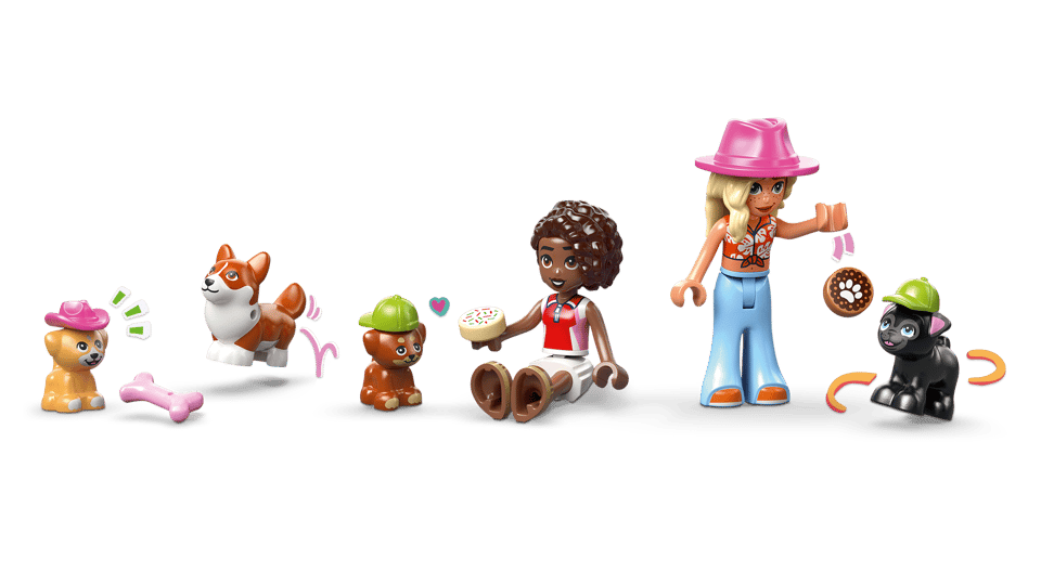 LEGO Friends: Dog Treats Bakery figures and animals on a green background