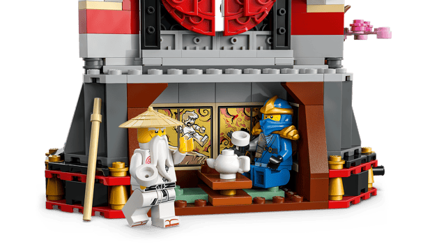LEGO Ninjago: Ninja Character Display 15th Anniversary set with two characters in a traditional Japanese setting on a transparent background