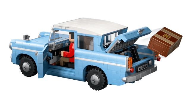 Blue LEGO Harry Potter: Enchanted Flying Ford Anglia™ with an open back and brown box on a transparent background