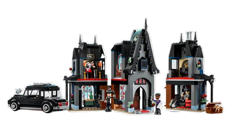 LEGO 'Wednesday' set with gothic house and characters, including packaging.