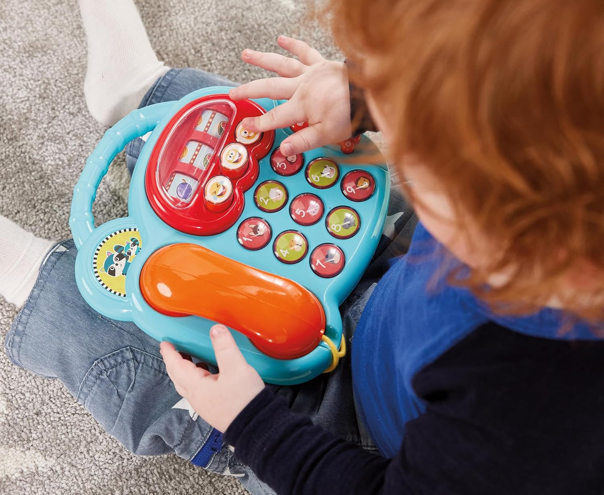 Child playing with a KidOozie - Animal Activity Phone on a carpeted floor
