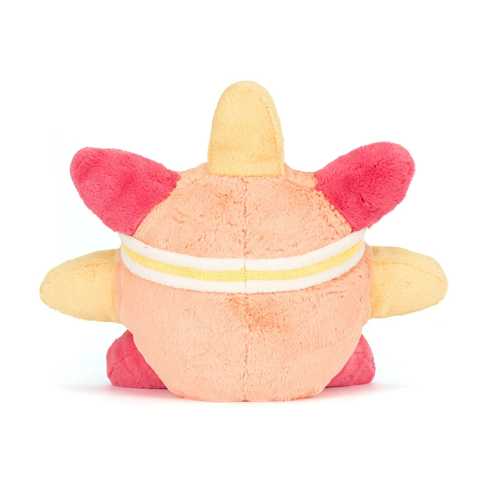 Soft plush toy with a round peach body, yellow and red star-shaped limbs, and a white and yellow striped band, representing Amuseables Sun 'Roller Skates'.