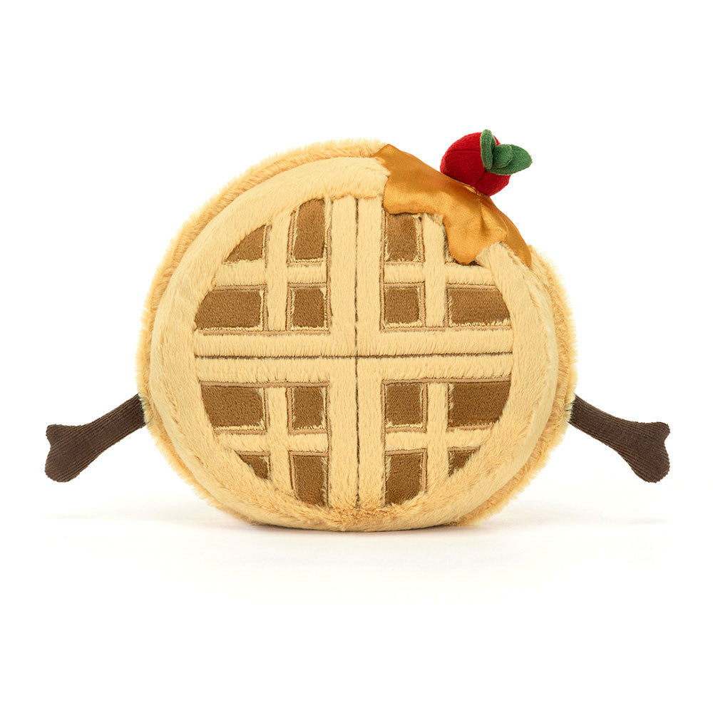 Soft plush toy designed as a waffle with a golden lattice pattern, topped with syrup and a red cherry, featuring outstretched brown arms, called Amuseables Rene Waffle.