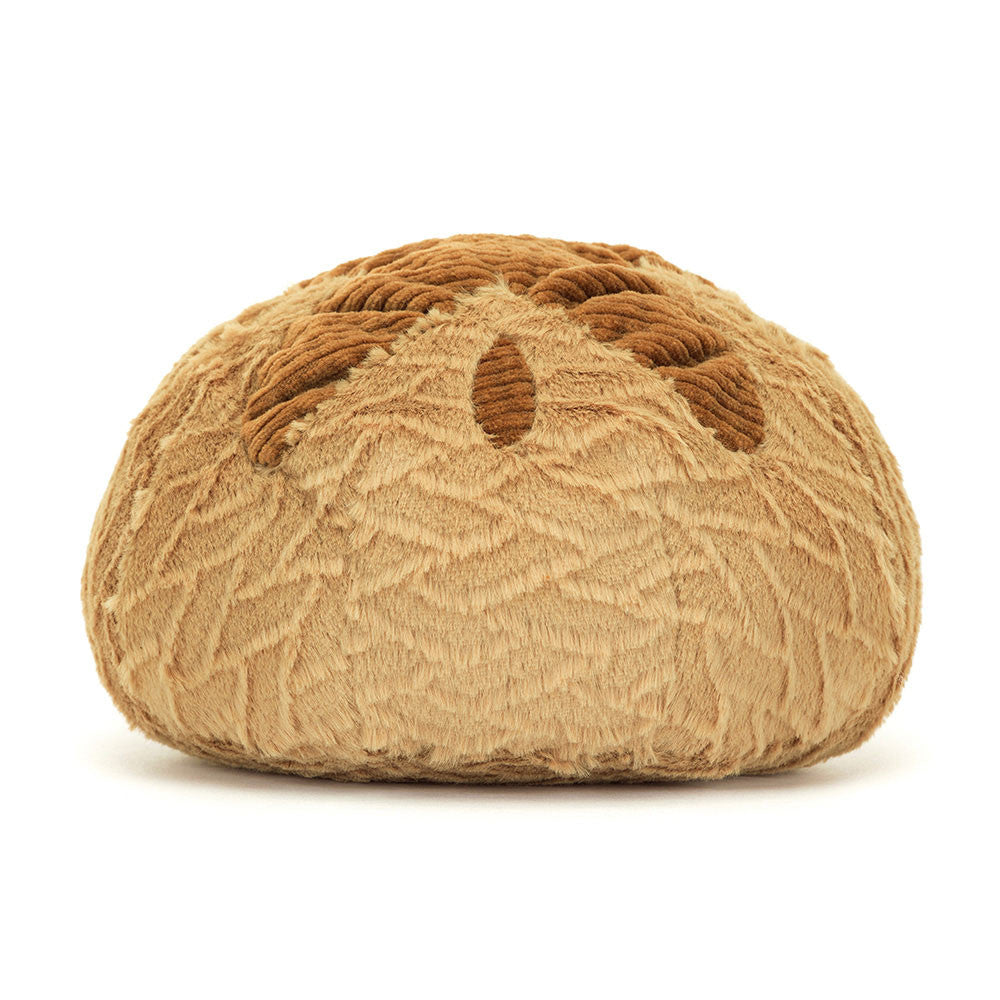 Soft, plush toy shaped like a round loaf of bread with textured brown crust details, representing Amuseables Sourdough in a friendly and cozy design.
