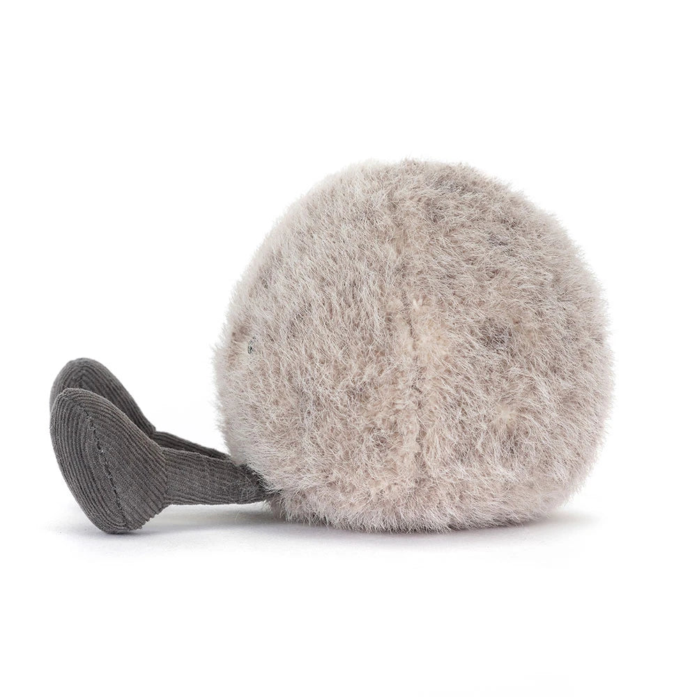 Soft and fluffy round plush toy with a small dark feet, designed as the Amuseables Pebble, perfect for a kid's birthday gift or toddler toy.