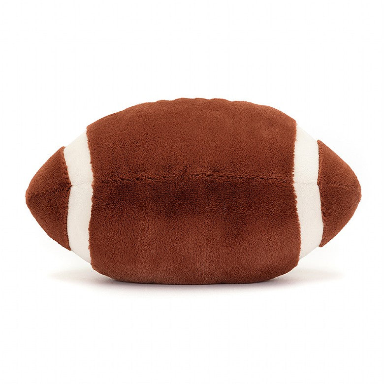 Soft plush toy shaped like a brown football with white stripes, designed for kids to enjoy as part of the Football Sports Amuseables collection.