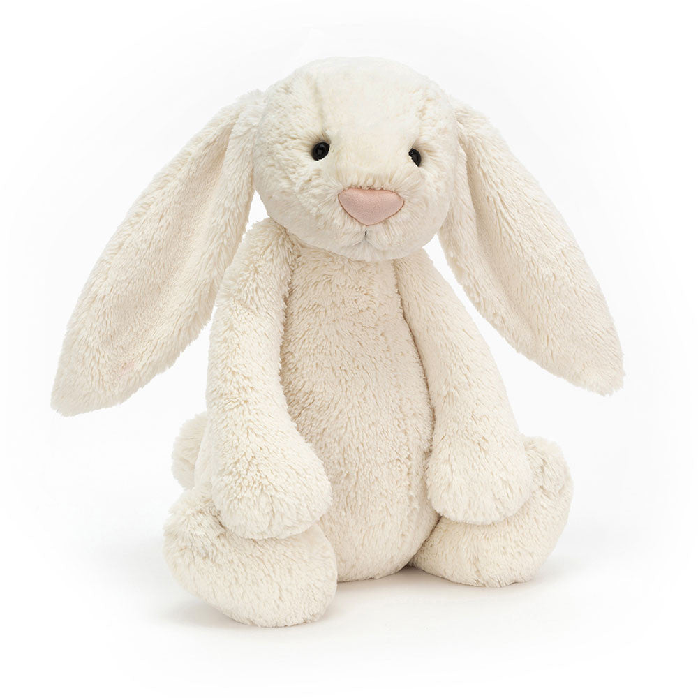 Bashful Cream Bunny Huge, a soft and cuddly cream-colored plush bunny with long floppy ears, perfect as a comforting stuffed animal for children.