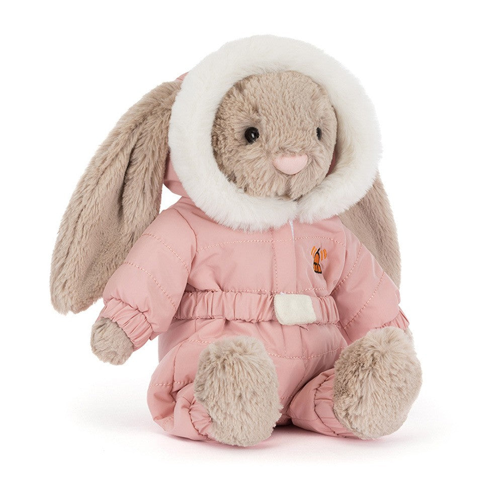 Soft plush bunny toy dressed in a pink cozy outfit with a furry hood, sitting upright, perfect as a cuddly companion or kid's gift called Bashful Bunny 'Snow Suit'.