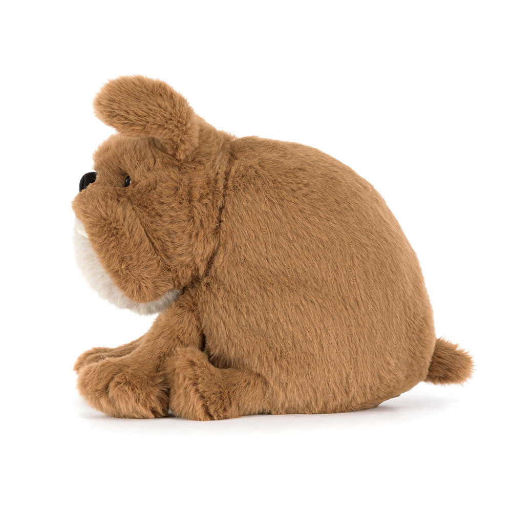 Brown plush Derreck Dog toy on a white background