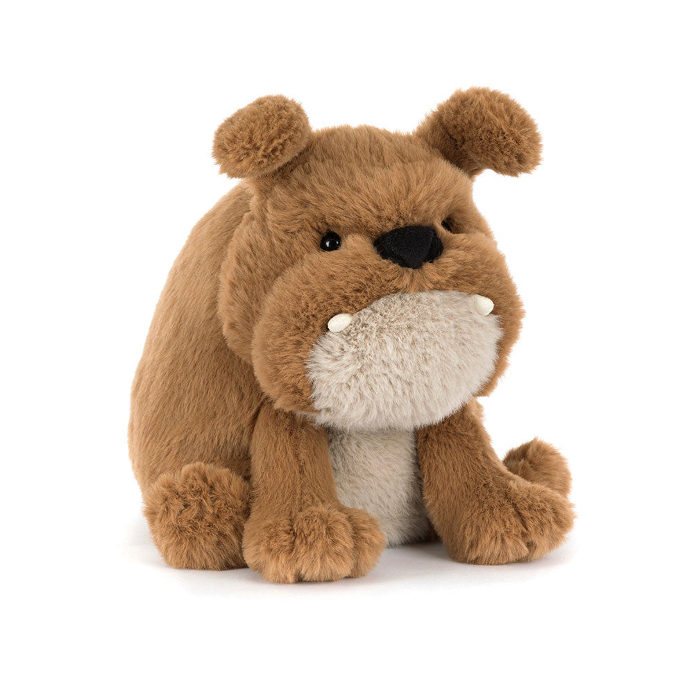 Brown plush Derreck Dog toy on a white background