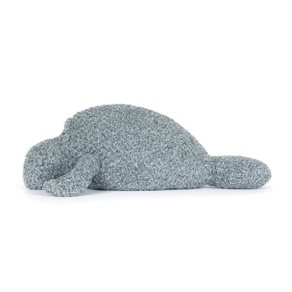 Soft gray plush stuffed animal shaped like a manatee lying flat, designed as a cuddly toy named Maffles Manatee for children’s play and comfort.