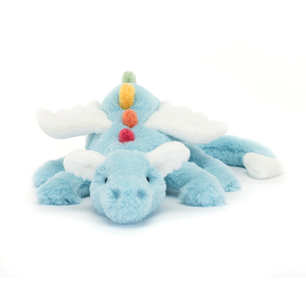 Soft blue plush dragon toy with white wings and colorful spikes lying down, called Sky Dragon Large, designed as a cuddly children’s stuffed animal.