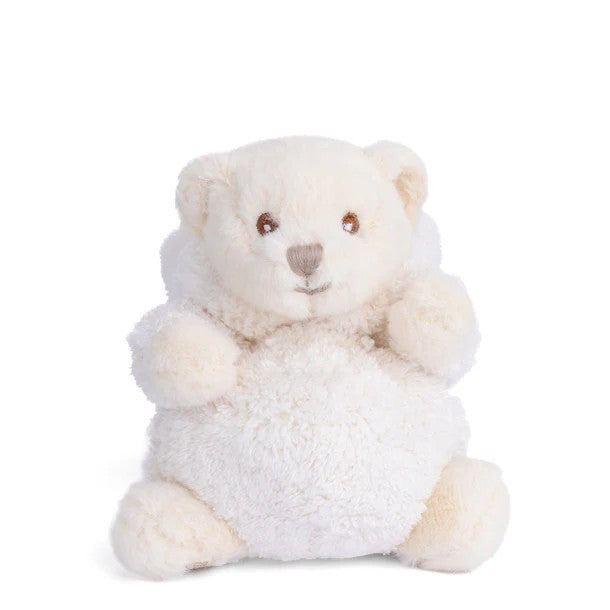 Plush toy bear dressed as a rabbit in a white outfit on a white background