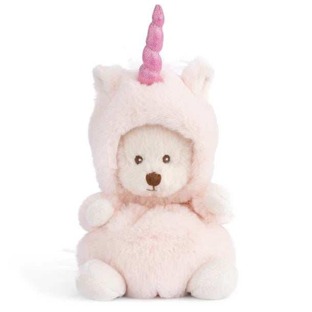 Plush toy bear wearing a pink unicorn costume with a white background