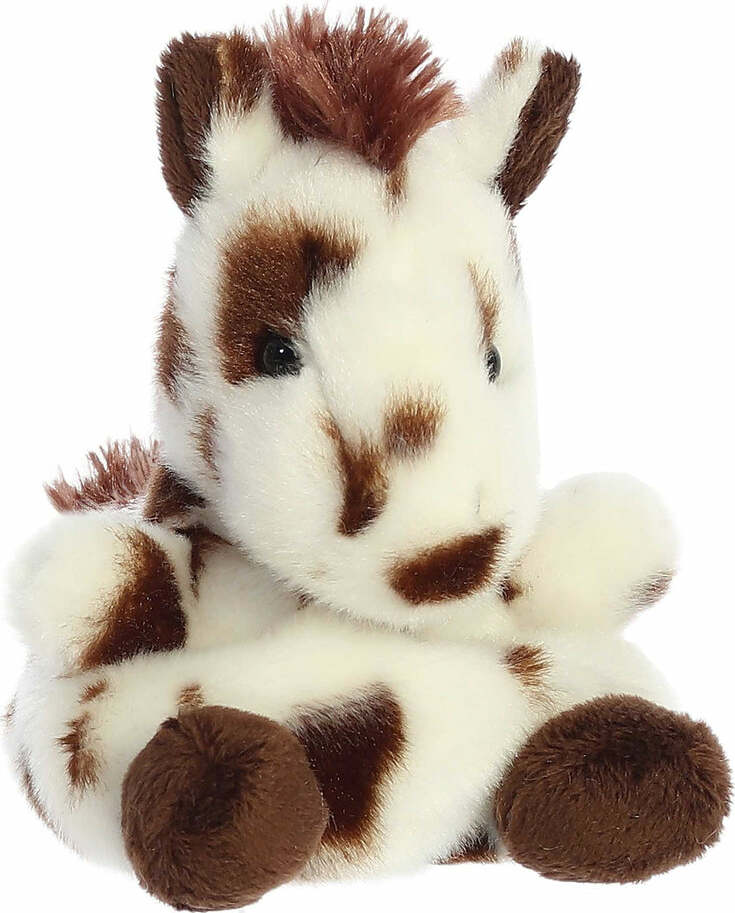 Plush toy horse with brown spots on a white background