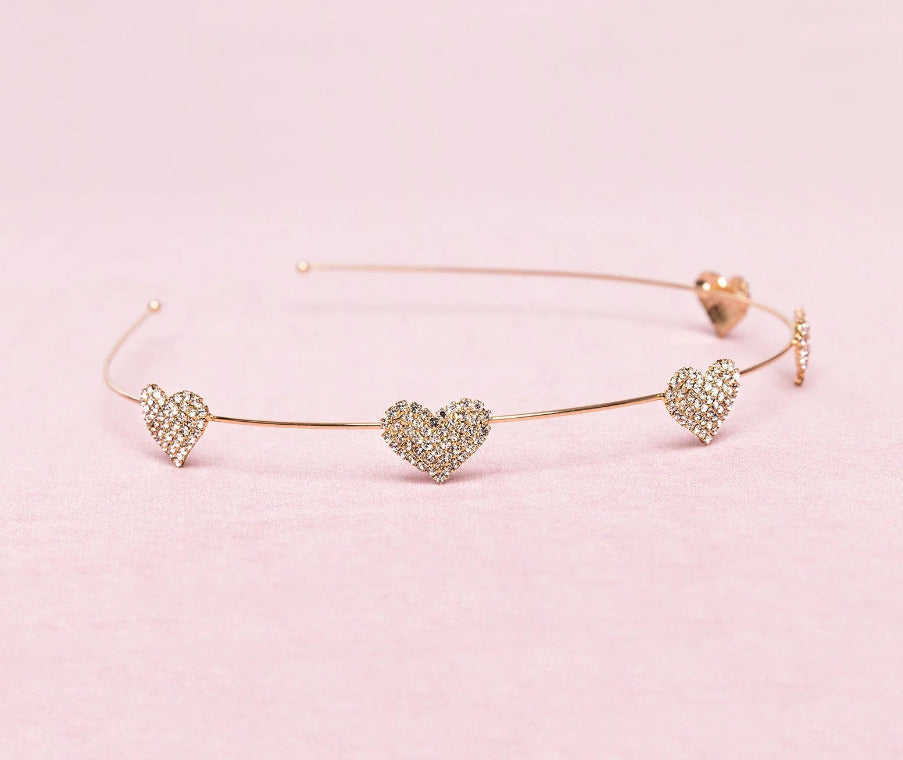 Boutique Rhinestone Heart Headband on a pink background