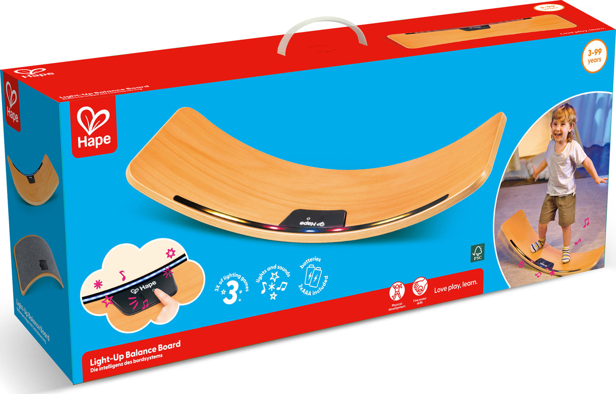 Hape light-up balance board packaging with a child using the product on the right side.