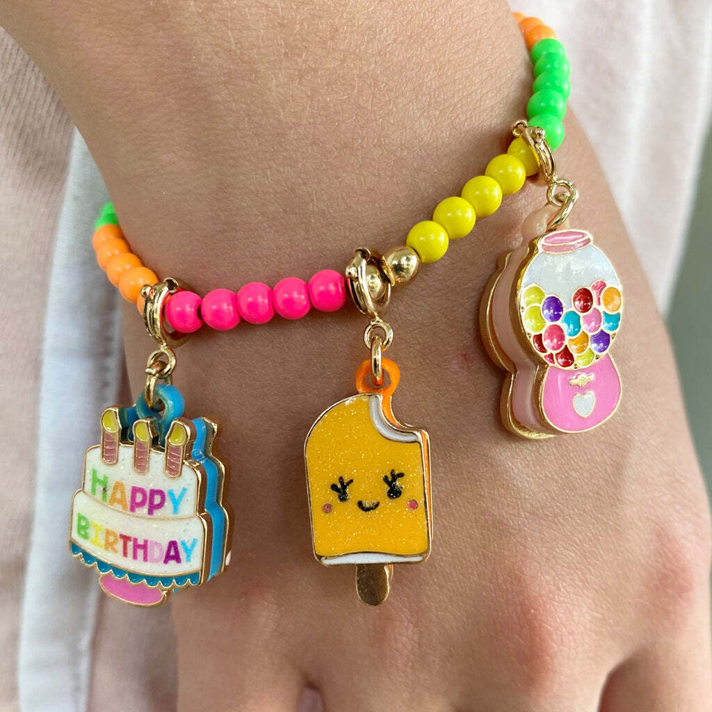 Colorful beaded bracelet with charms on a wrist