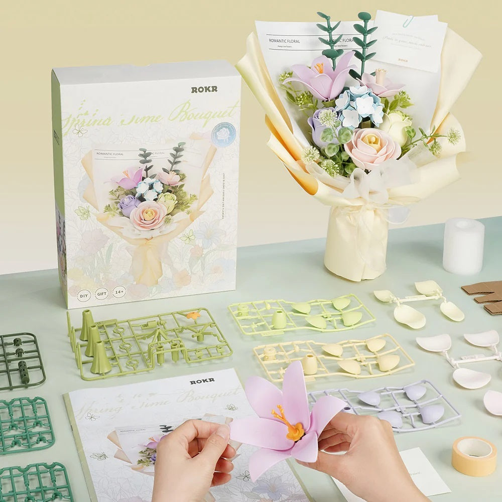 Spring Time Bouquet DIY 3D Puzzle kit with hands crafting flowers on a table
