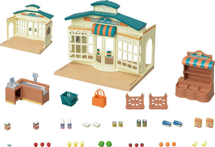 Toy grocery market set with various items on a white background