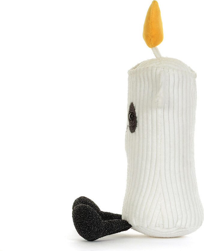 A white ribbed plush Amuseables Flickerty Candle toy with a yellow flame, black embroidered eye, and black feet, photographed on a clean white background.