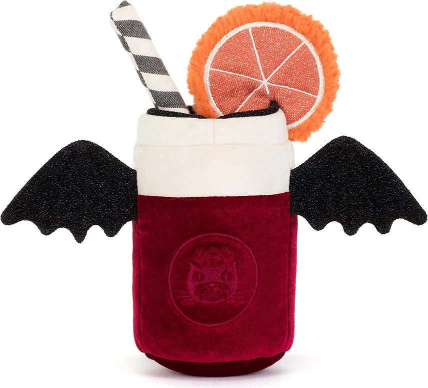 A plush Amuseables Vampop Drink toy featuring a deep red velvet-textured body, white upper section, black bat wings, a black-and-white striped straw, and an orange slice garnish on a white background.
