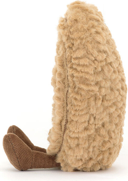Side view of Amuseables Philippe Palmier plush toy resembling a textured beige cookie with brown corduroy feet, perfect as a unique kids' gift .