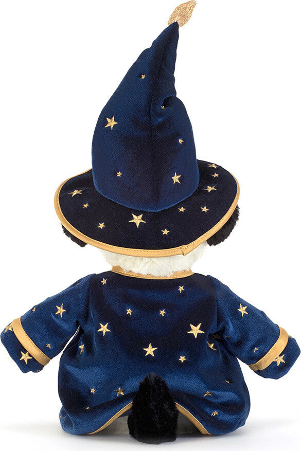 A plush Rufferty Puppy Wizard Outfit toy shown from the back, wearing a dark blue wizard costume with gold embroidered stars and trim, a pointed wizard hat, and a white fluffy neck.