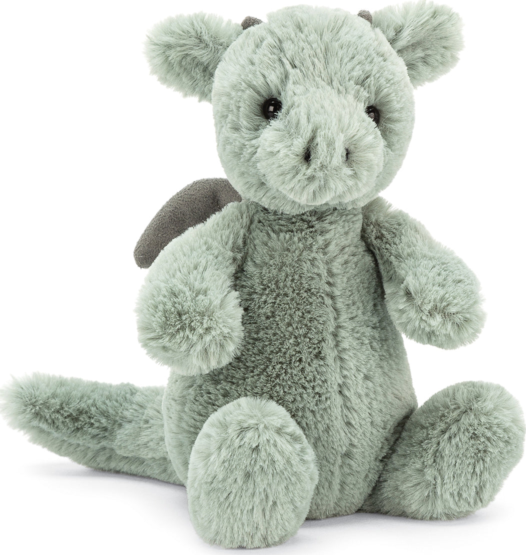 Soft and cuddly Bashful Dragon Small plush toy in a pale green color, featuring black eyes, small wings, and a friendly, huggable design perfect for toddlers and children.