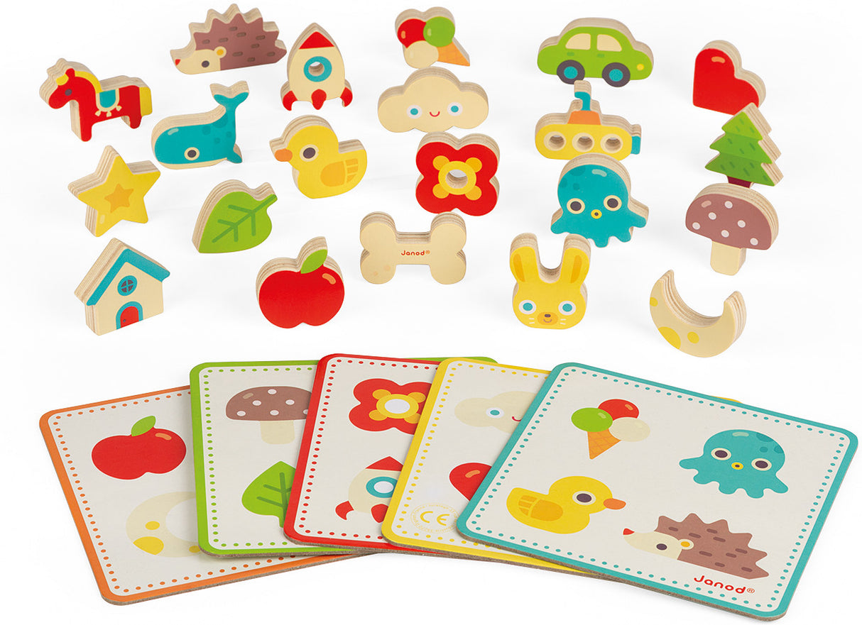 Set of wooden toys with cards featuring animal and object illustrations from the Memory Touch Recognition Game on a white background