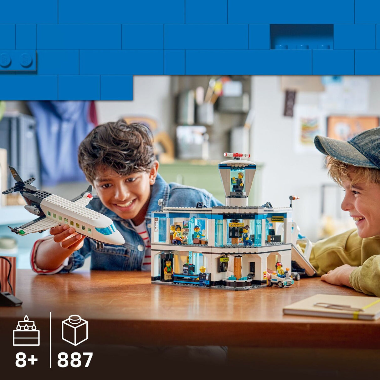 Children playing with the LEGO My City: Airport with Airplane
