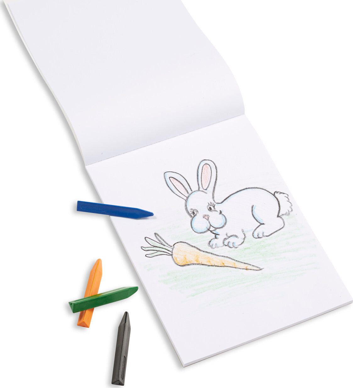Drawing Paper Pad with drawing of bunny and carrot along with crayons on white background.