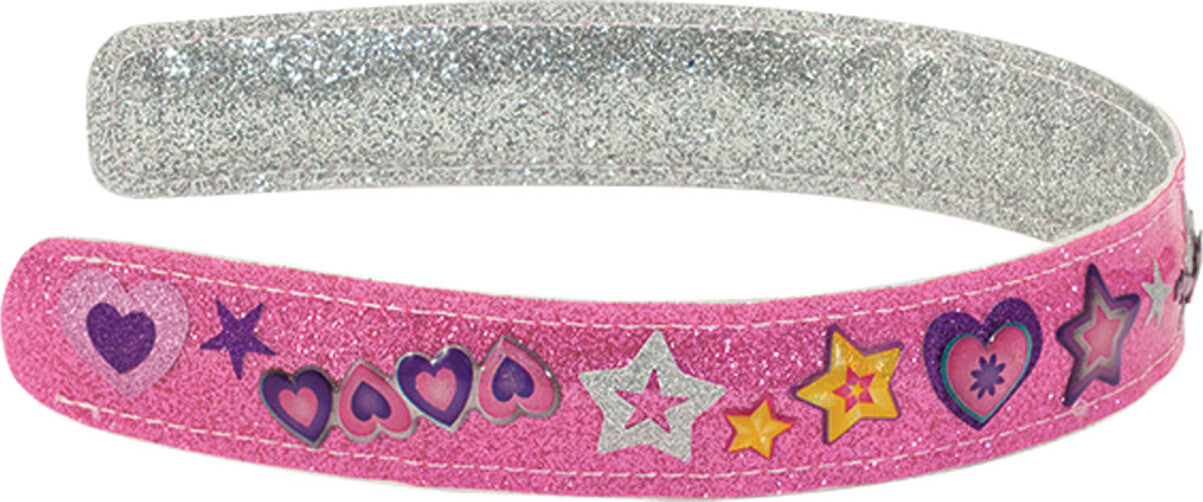 Created by Me! Headbands Design and Decorate Craft Kit showing a glittery headband pink and silver, with decorative patterns on a white background.
