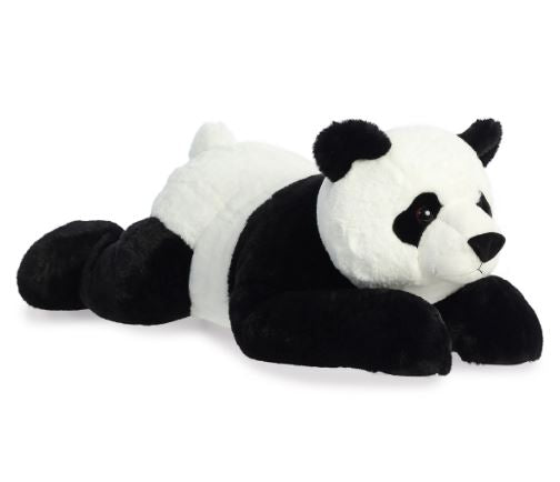Plush panda toy lying on a white background