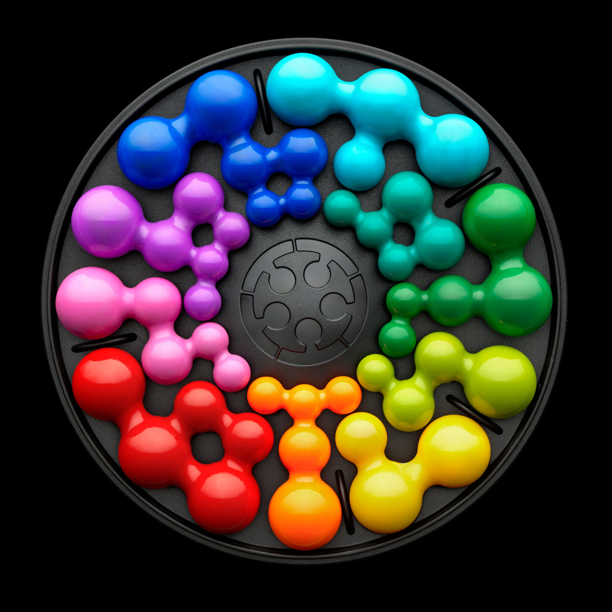 Colorful IQ Deluxe - Circle puzzle set on a black background