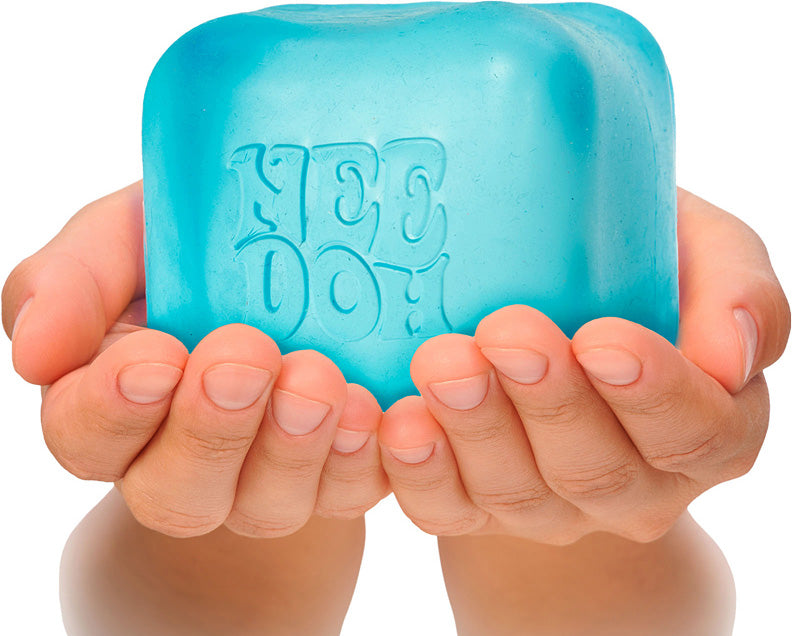 Blue NeeDoh Nice Berg held in hands against a white background