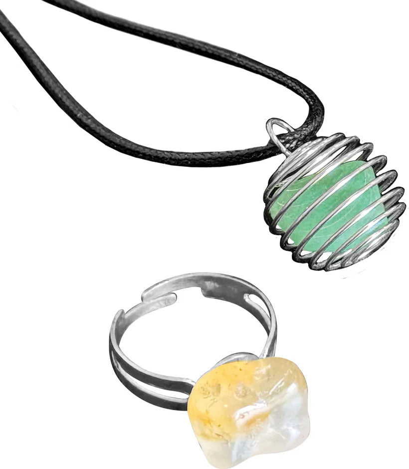 Silver ring with a yellow stone and matching pendant on a white background made by using The Thames & Kosmos Rock Tumbler