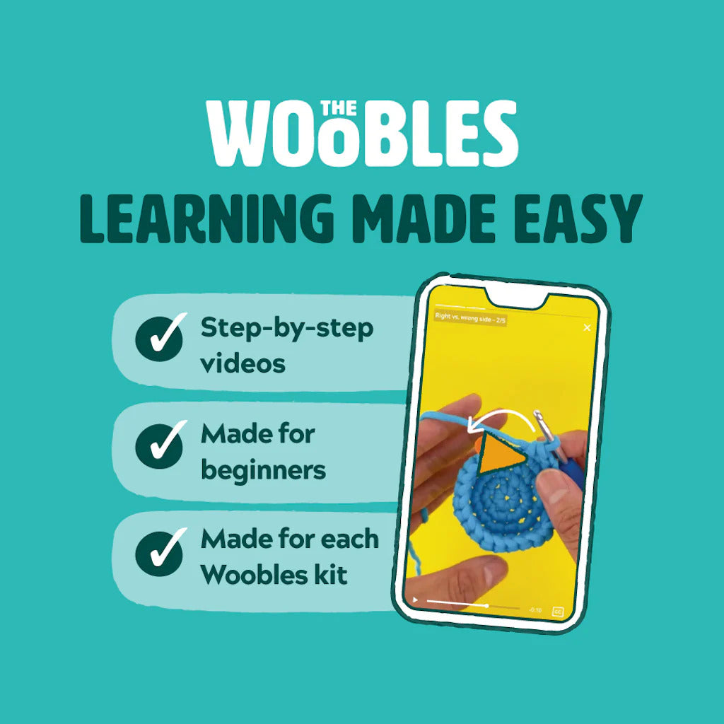 Advertisement for 'The Woobles' with a phone showing a knitting tutorial on a teal background.