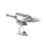 Metal model of the Enterprise NCC-1701 spaceship on a white background