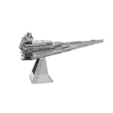 Metal model of an Imperial Star Destroyer spaceship on a white background