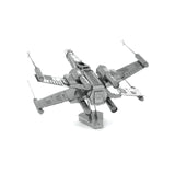Metal model of a X-Wing Star Fighter spacecraft on a white background