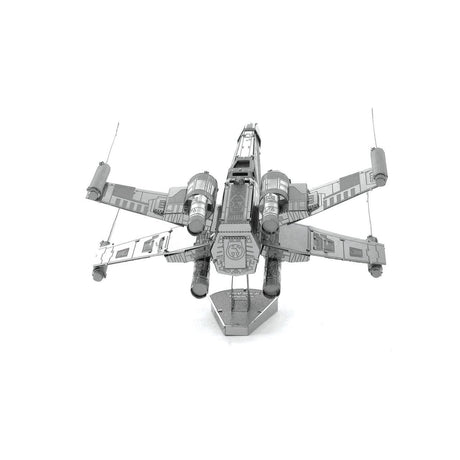 Metal model of a X-Wing Star Fighter spaceship on a white background