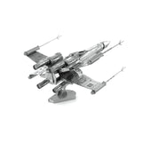 Metal model of a X-Wing Star Fighter on a white background