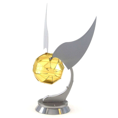 Metal model of a Golden Snitch from Harry Potter on a white background